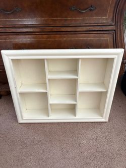 Vintage wooden ivory painted shadow box for collectibles .