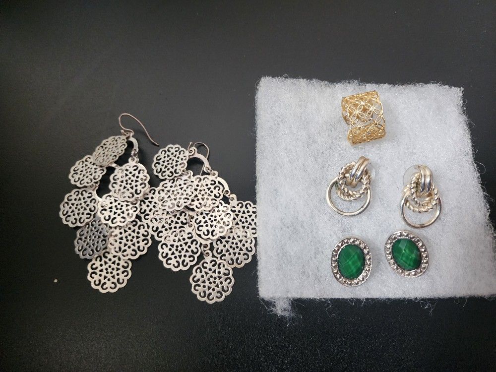 Three earrings and a ring, all together 12$