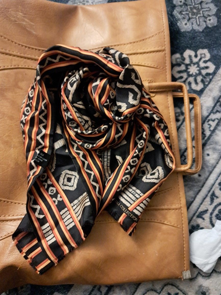 VINTAGE UN Plaza Park Hyatt Ikat Silk Scarf Persian Tribal Moroccan PrintWrap yourself in the luxurious warmth of silk with this Vintage UN Plaza Park