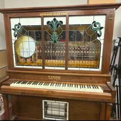 Beautiful 1911 Stroud electric player piano. 