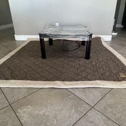 Asian Style dining table equipped with heater and its own floor blanket/mat.