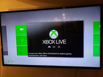 XBOX360 with Kinnect, 2 wireless controllers, and 25 games