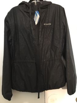 Columbia woman’s light weight Rain Jacket XL Black new with $75 price tags. Never worn