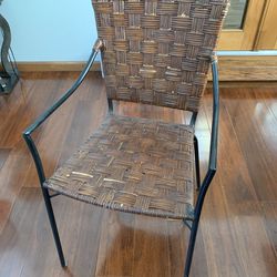 Brown Rattan Chair With Black Metal Frame