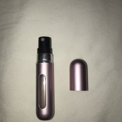 Pink refillable perfume bottle