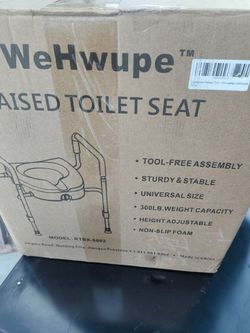 Raised toilet seat