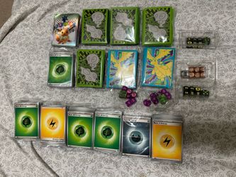 Pokemon card sleeves and energy pack lot