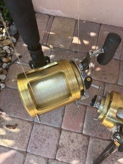 Two 80 wide Shimano Tiagra reels on custom rods