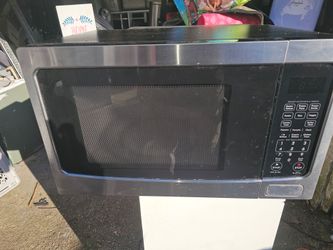 Price is firm.. Kenmore stainless microwave oven