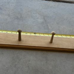 Coat Hanger Pegs On Board. Unfinished Wood