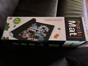 Puzzles and a roll up mat