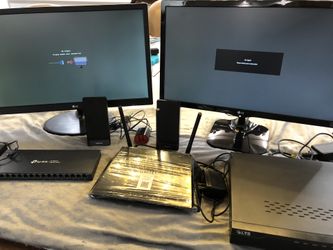 DVR, Router,  16 Port Gigabit Desktop Switch, Speakers (2) and Computer Monitors (2) 