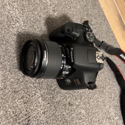Canon EOS Rebel T7 with the EF-S 18–55mm kit lens.