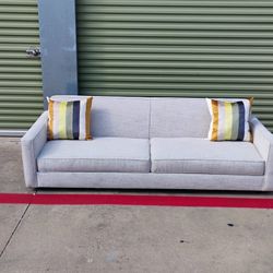Couch with pillows in great condition, No damage, Smoke free Delivery Available 