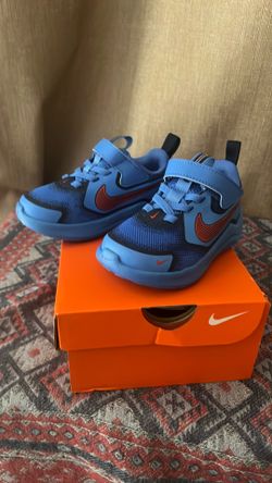 Nike COSMIC Runner swoosh