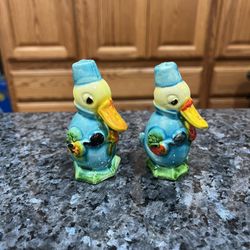 Vintage Old Blue Duck Pair of Salt and Pepper Shakers.  Hand Painted.  Made in Japan stamped Japan on the bottom.  Preowned missing stoppers.  