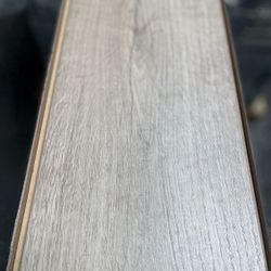 TrafficMaster Oak Knoll 8 mm T x 7.5 in. W Water Resistant Laminate Wood Flooring (23.7 sqft/case)