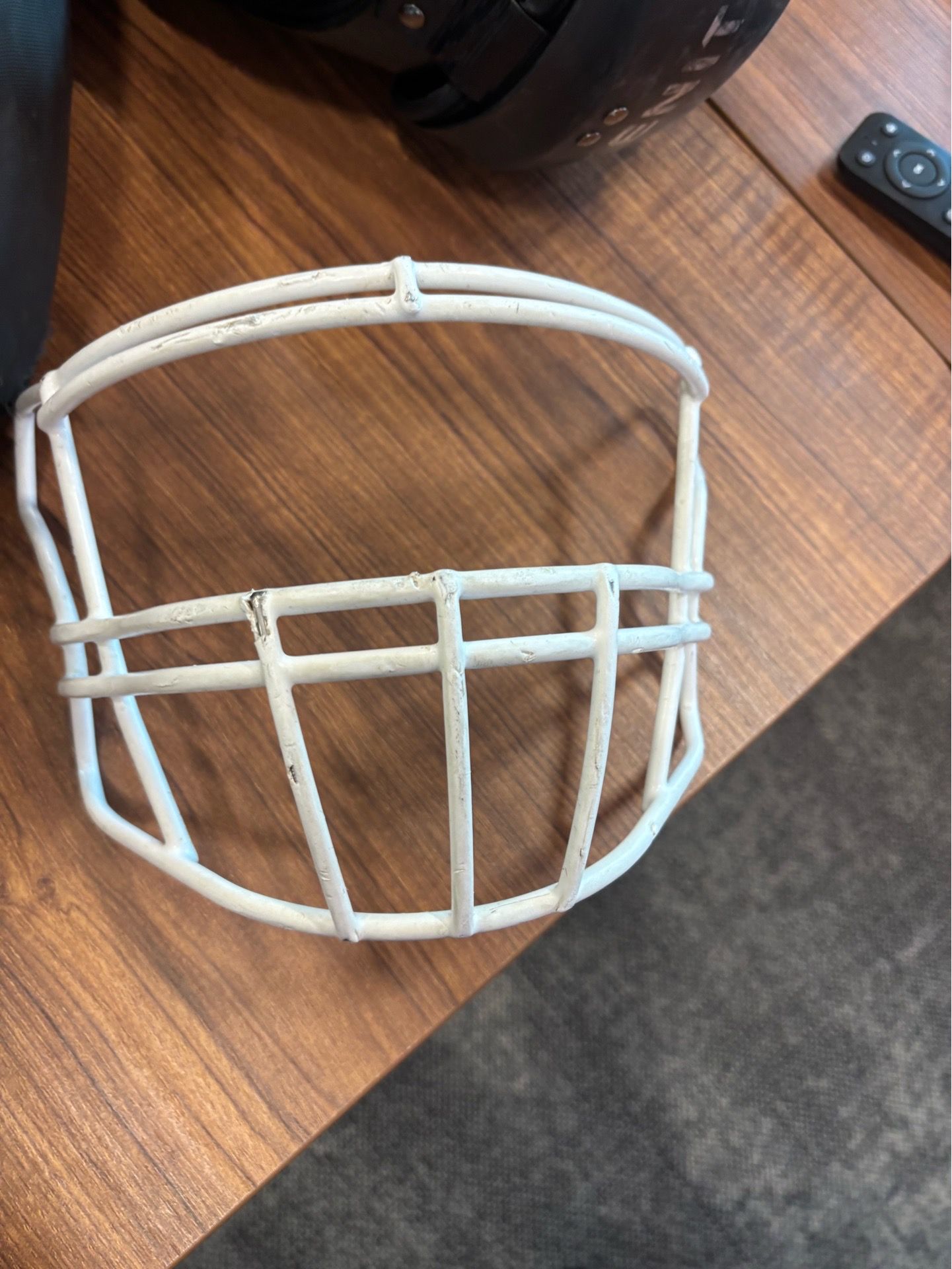 white riddial facemask