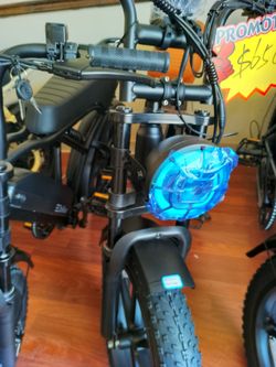Open box moped style ebike brown leather