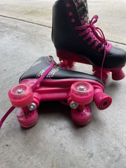 Pink And Black Roller Skates