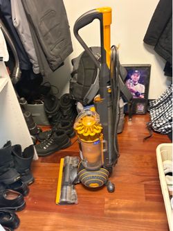 2 Dyson Vacuums