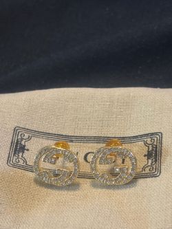 Gold tone gg interlocking logo crystal earrings