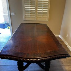 Dining room dark brown table, 6 chairs included