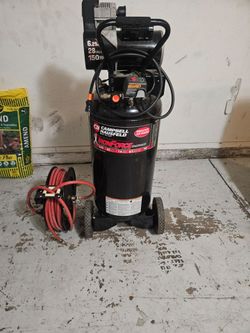 Air compressor with hose reel