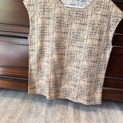 New Brown With Black Going Through It. It’s A Summer Shirt Short Sleeves As You Can See.