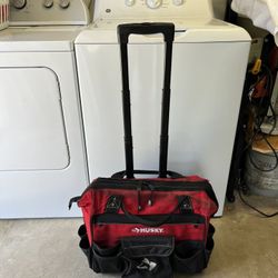 Husky Rolling Tool Bag Zippers Up With Wheels And Extension Handle