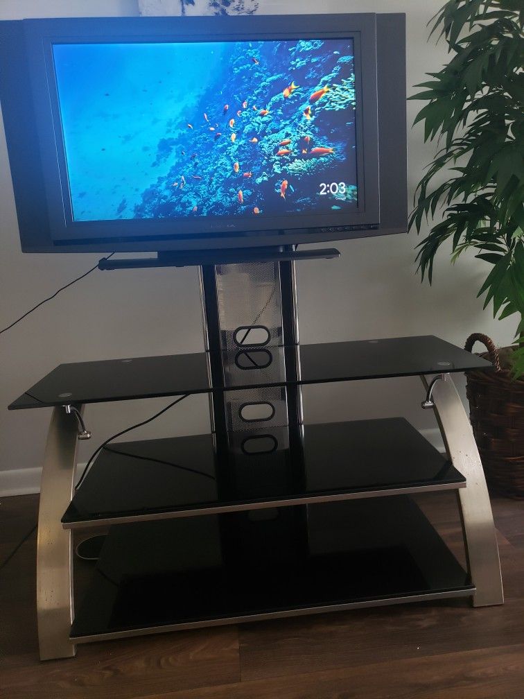 TV With Black Glass Entertainment Center 
