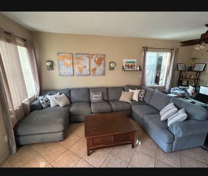 Beautiful large grey sectional couch from Jerome's