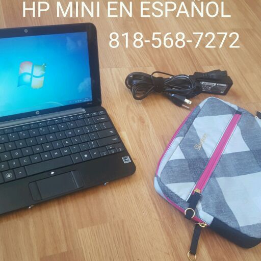 Mini laptop hp in spanish great condition with charger and case