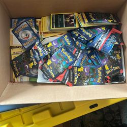 Mixed Pokémon Cards And Packs 