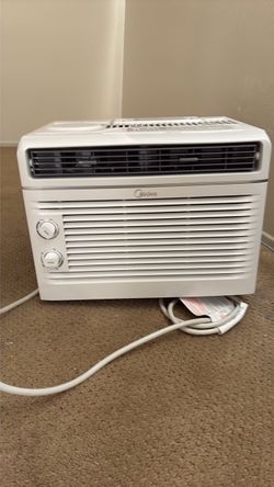 Almost New Midea window Air conditioner unit