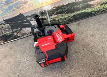 Milwaukee M18 FUEL SDS-Plus Rotary Hammer with a HAMMERVAC Dust Extractor $460