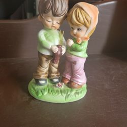 Boy And Girl Sipping Same Cup Figurine