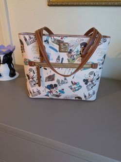Dooney & Bourke Disney Epcot Food & Wine Festival tote bag.