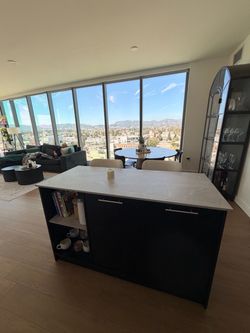 Black Kitchen Island with White Countertop