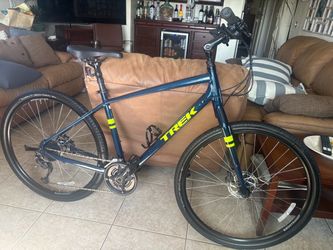 Trek     verve.   3     18 velocity.      Hibrida