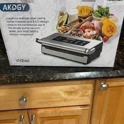 New Stainless Steel Vacuum Sealer by AKDGY. Double heat for dry, moist, and liquid. various modes. easy lock handle 
