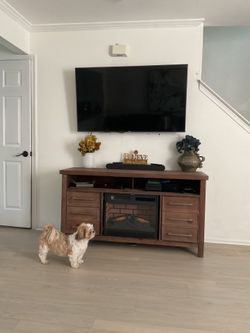 TV stand with additional electric fireplace insert added