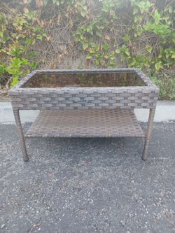 StyleWell Wicker Table with glass top and storage