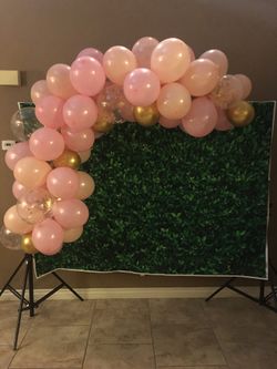 Leaf backdrop with balloon arch