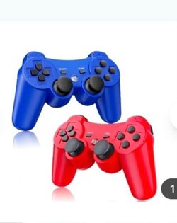 Two PS3 play station three wireless game controllers