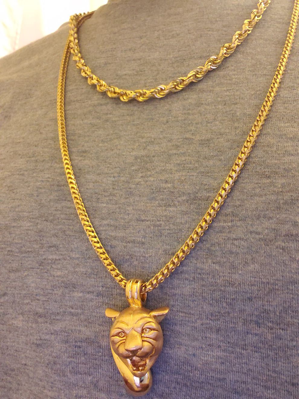 10k Gold chains with 14k Panther head Pendant
