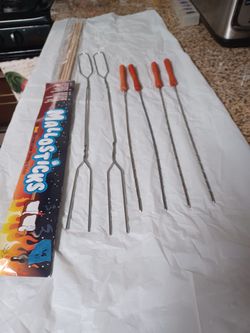 New: Summer  Hot dog Prongs, Barbecue skewers.& marshmallow sticks new in pkg. All for  $5.