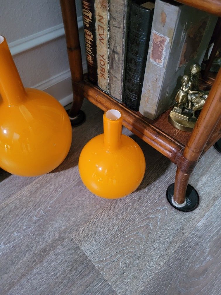 2 Orange Vases That Are 15inches Tall And 10inches Tall
