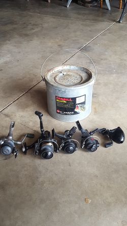 Minnow bucket and 5 reels