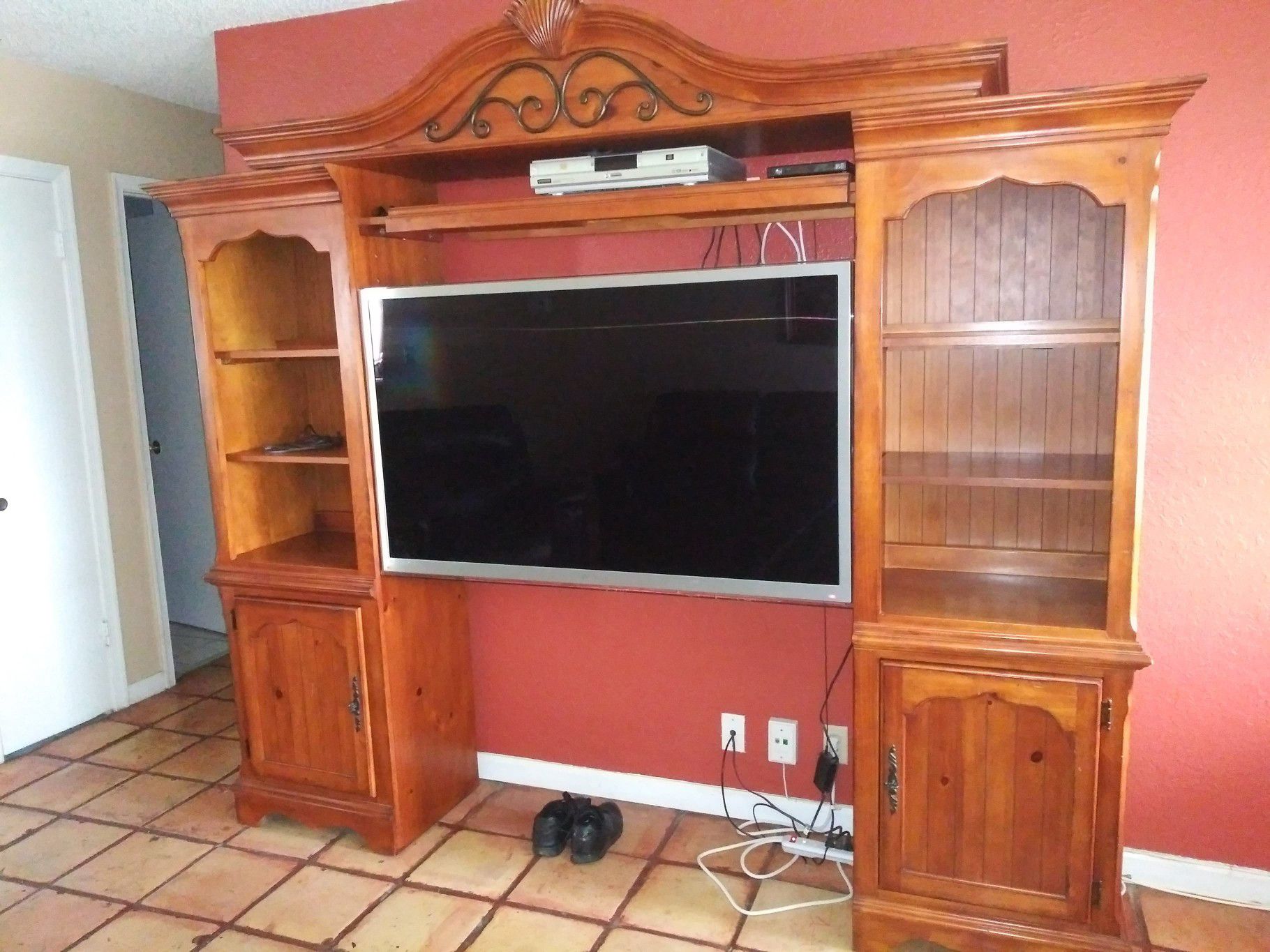 3pc wood wall unit and 55 inch tv 200 takes both . TV lights flick a little not bad but can be fixed.